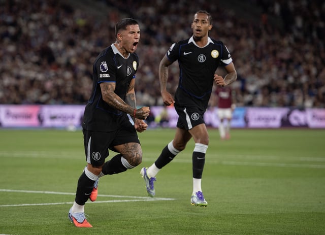 Enzo Fernández of Chelsea (L) celebrates scoring his team's third goal during the Premier League match between West Ham United and Chelsea at London Stadium on August 22, 2025, in London, England.