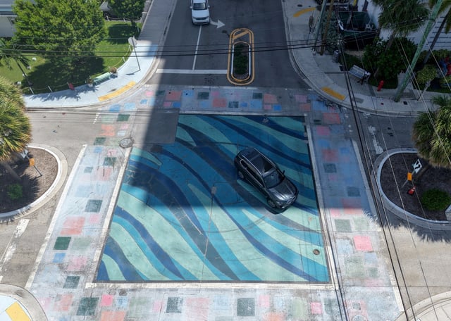 The intersection at Breakers Avenue and Terramar Street in Fort Lauderdale has a wave pattern in the center, with the crosswalks painted in squares of color, Thursday, Aug. 28, 2025. (Mike Stocker/South Florida Sun Sentinel)