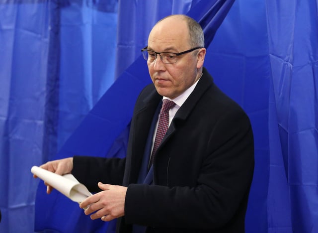 Ukraine's Parliamentary Speaker Andriy Parubiy walks out of a voting booth at a polling station during a presidential election in Kyiv, Ukraine March 31, 2019.
