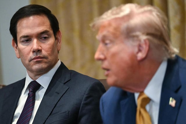 U.S. Secretary of State Marco Rubio, left, looks on as President Donald Trump speaks during a cabinet meeting in the Cabinet Room of the White House in Washington, D.C., on July 8, 2025. (ANDREW CABALLERO-REYNOLDS/GETTY IMAGES NORTH AMERICA/TNS)