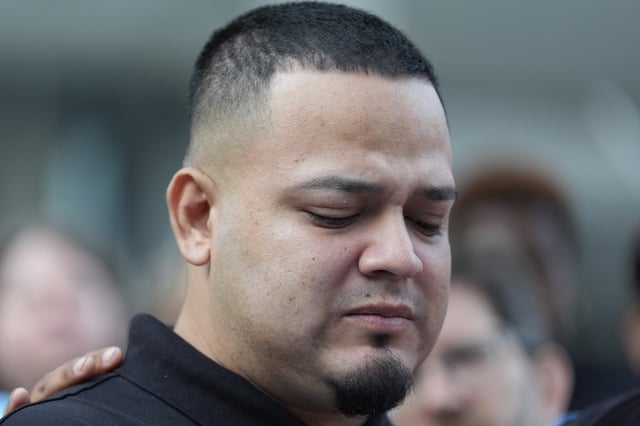 Kilmar Abrego Garcia attends a protest rally at the Immigration and Customs Enforcement field office in Baltimore, Monday, Aug. 25, 2025, to support Abrego Garcia. (AP Photo/Stephanie Scarbrough)