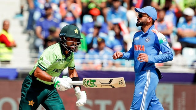 Babar Azam and Virat Kohli in action