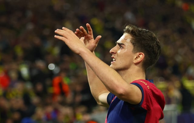 Soccer Football - Champions League - Quarter Final - Second Leg - Borussia Dortmund v FC Barcelona - Signal Iduna Park, Dortmund, Germany - April 15, 2025 FC Barcelona's Gavi celebrates their first goal, an own goal scored by Borussia Dortmund's Ramy Bensebaini REUTERS/Thilo Schmuelgen/File Photo