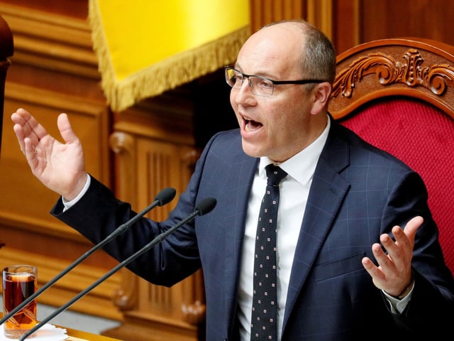 FILE PHOTO: Andriy Parubiy, who at the time was Ukrainian Parliamentary Speaker, reacts during a session of parliament in Kiev, Ukraine, May 22, 2019. REUTERS/Valentyn Ogirenko/File Photo