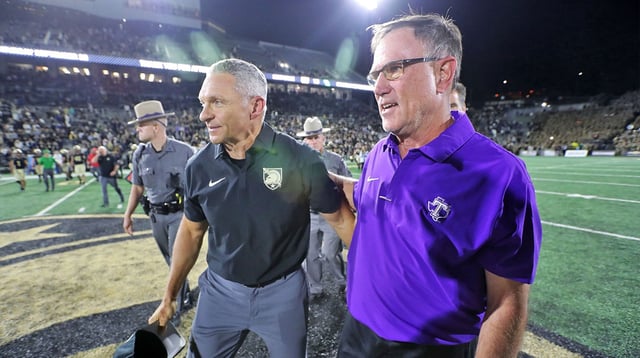 Aug 29, 2025; West Point, New York, USA; Army Black Knights head coach Jeff Monken congratulates Tarleton State Texans head coach Todd Whitten after the Texans’ double-overtime win at Michie Stadium. Mandatory Credit: Danny Wild-Imagn Images.