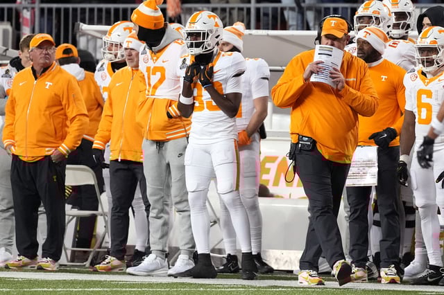 Head coach Josh Heupel (R) of the Tennessee Volunteers looks on during the second quarter against the Ohio State Buckeyes in the Playoff First Round Game at Ohio Stadium on December 21, 2024 in Columbus, Ohio.