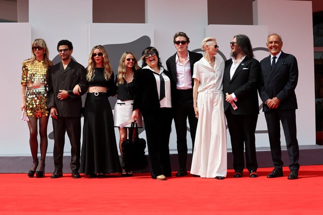 Directors Iain Forsyth and Jane Pollard, Producer Beth Earl, and cast members Tilda Swinton, Calvin Demba, Sophia Di Martino, Suki Waterhouse and George MacKay pose with Venice Film Festival Artistic Director Alberto Barbera on the red carpet for the screening of the movie "Broken English" out of competition, at the 82nd Venice International Film Festival, in Venice, Italy, August 30, 2025. REUTERS/Yara Nardi