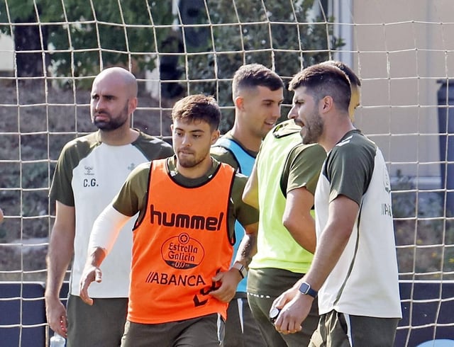Claudio Giráldez y Fran Beltrán, en un entrenamiento de este verano en la ciudad deportiva Afouteza