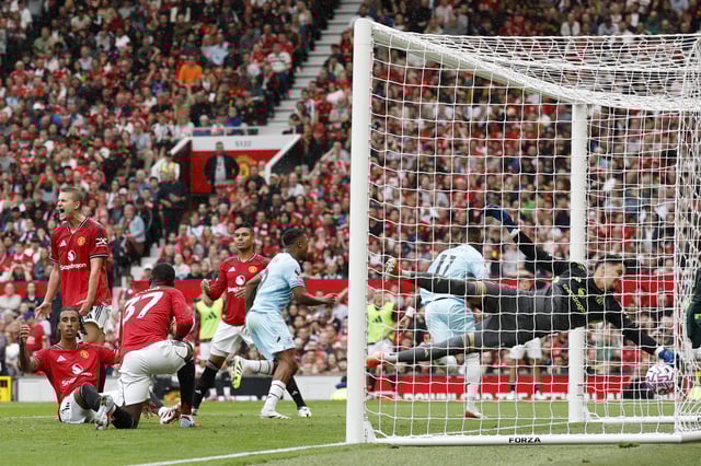 Soccer Football - Premier League - Manchester United v Burnley - Old Trafford, Manchester, Britain - August 30, 2025 Burnley's Jaidon Anthony scores their second goal as Manchester United's Altay Bayindir dives Action Images via Reuters/Jason Cairnduff