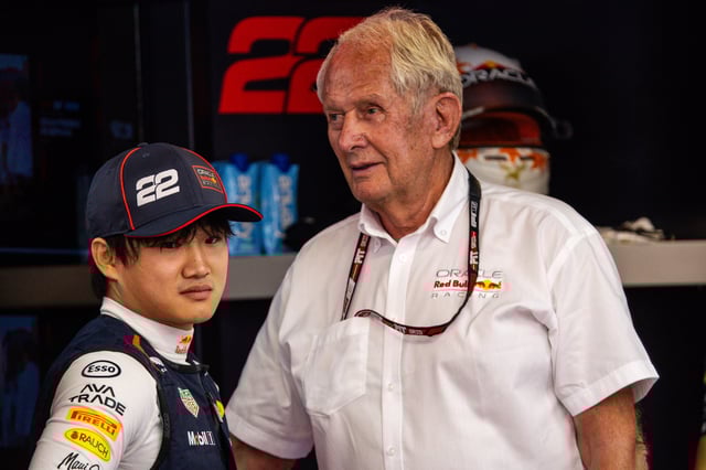 Oracle Red Bull Racing Team Consultant Dr Helmut Marko speaks with Yuki Tsunoda of Japan and Oracle Red Bull Racing in the garage during practice ahead of the F1 Grand Prix of Spain at Circuit de Barcelona-Catalunya on May 30, 2025 in Barcelona, Spain.