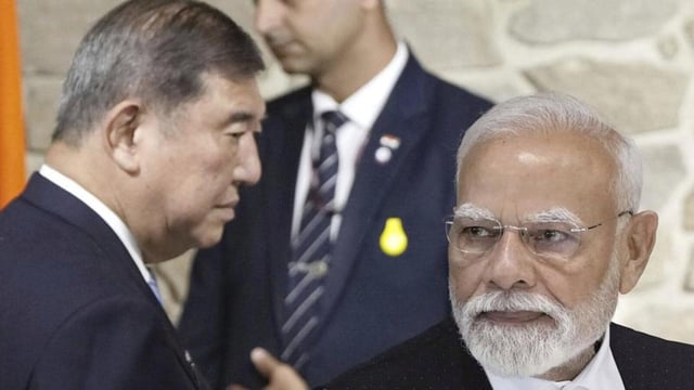 Indian Prime Minister Narendra Modi, right, and Japanese Prime Minister Shigeru Ishiba attend a luncheon at a hotel in Sendai, Japan. (AP)