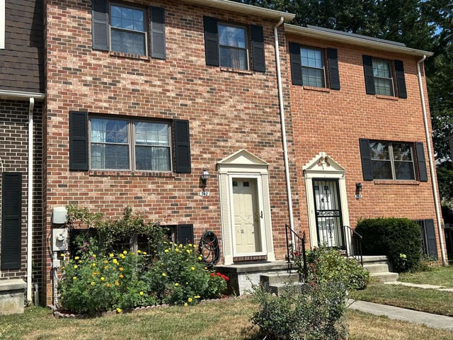 The home on Wilton Farm Drive in Catonsville where three people were found dead on Thursday in what Baltimore County police believe was a double-murder suicide. (Todd Karpovich/Staff)