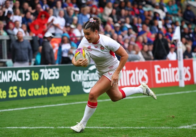 Rugby Union - Women's World Cup 2025 - Pool A - England v Samoa - Franklin's Gardens, Northampton, Britain - August 30, 2025 England's Jess Breach scores their thirteenth try to complete a hat-trick Action Images via Reuters/Andrew Boyers