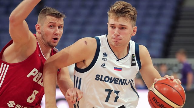 Aug 31, 2017; Helsinki, FINLAND; Poland player Przemyslaw Zamojski (8) defends against Slovenia player Luka Doncic (77) during their FIBA Eurobasket Group A match in Helsinki Arena 31. Mandatory Credit: Matti Matikainen/Newspix24/Sipa USA via USA TODAY NETWORK