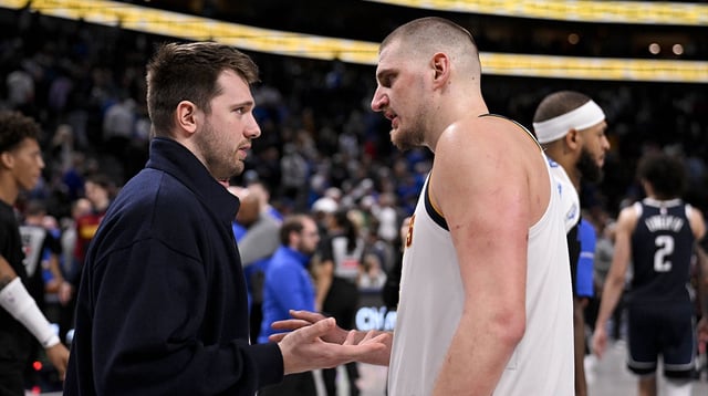 Jan 12, 2025; Dallas, Texas, USA; Dallas Mavericks guard Luka Doncic (left) talks with Denver Nuggets center Nikola Jokic (right) after the game at the American Airlines Center. Mandatory Credit: Jerome Miron-Imagn Images.