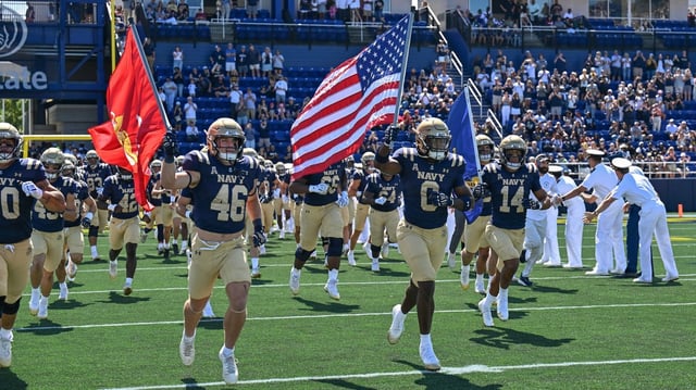 Aug. 30, 2025: The Midshipmen take the field. The Navy Midshipmen play their NCAA football season opener at home against the visiting VMI Keydets at Navy-Marine Corps Memorial Stadium in Annapolis. (Paul W. Gillespie/Staff)
