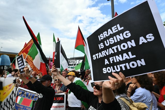 People take part in a demonstration in support of Gaza and Palestinian people at Venice Lido during the 82nd Venice International Film Festival, on August 30, 2025.