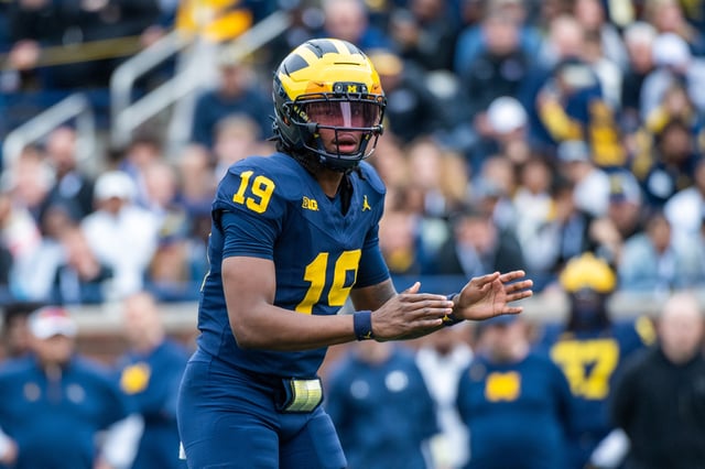 Bryce Underwood #19 of the Michigan Wolverines prepares to receive the ball during the second half of the Michigan Maize vs Blue Spring Football Game at Michigan Stadium on April 19, 2025 in Ann Arbor, Michigan.