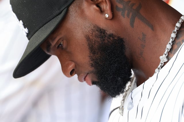 White Sox center fielder Luis Robert Jr. sits in the dugout before a game against the Phillies on July 30, 2025, at Rate Field. (John J. Kim/Chicago Tribune)