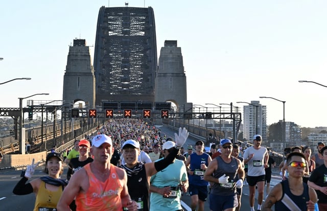 Athletes compete in the 2025 Sydney Marathon, crossing the iconic Harbour Bridge