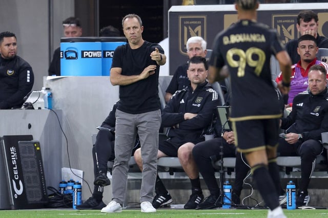 Los Angeles FC head coach Steve Cherundolo, left, point to forward Denis Bouanga during the first half of an MLS match against the L.A. Galaxy at BMO Stadium in Los Angeles, on Saturday, July 19, 2025.  The match ended in a draw 3-3.  (Photo by Raul Romero Jr., Contributing Photographer)