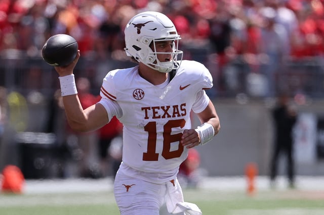 Aug 30, 2025; Columbus, Ohio, USA; Texas Longhorns quarterback Arch Manning (16) drops back to pass against the Ohio State Buckeyes in the first half at Ohio Stadium. Mandatory Credit: Joseph Maiorana-Imagn Images