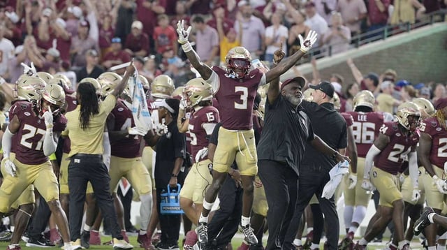 Florida State Seminoles running back Kam Davis (3) and associate head coach Odell Haggins react after a play Alabama Crimson Tide during the second half at Doak S. Campbell Stadium. Mandatory Credit: Melina Myers-Imagn Images