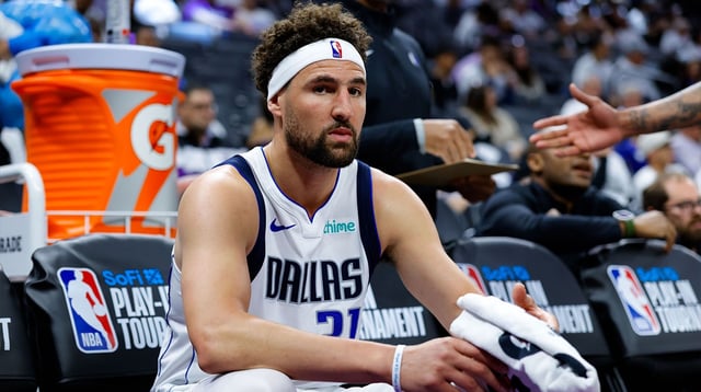 Apr 16, 2025; Sacramento, California, USA; Dallas Mavericks guard Klay Thompson (31) sits on the bench during the fourth quarter against the Sacramento Kings at Golden 1 Center.