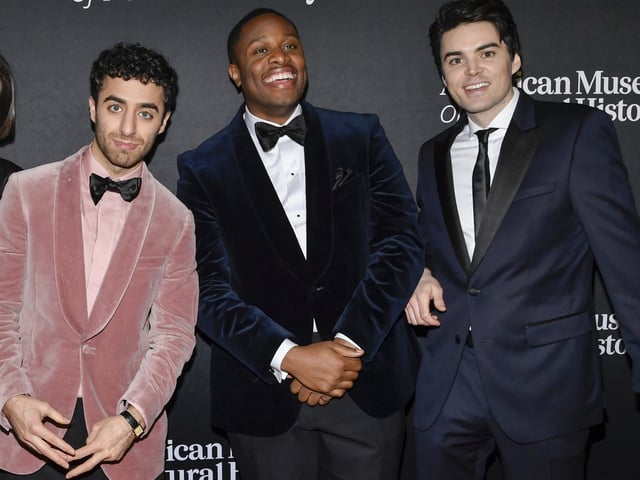 Emil Wakim, from left, Devon Walker and Michael Longfellow appear at the American Museum of Natural History's Museum Gala in New York on Dec. 5, 2024.