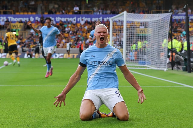 Erling Haaland of Manchester City celebrates after scoring their side's third goal during the Premier League match between Wolverhampton Wanderers and Manchester City at Molineux on August 16, 2025 in Wolverhampton, England.