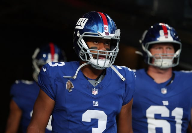 EAST RUTHERFORD, NEW JERSEY - AUGUST 21: Russell Wilson #3 of the New York Giants comes out of the tunnel onto the field prior to the game against the New England Patriots during the NFL Preseason 2025 game between New England Patriots and New York Giants at MetLife Stadium on August 21, 2025 in East Rutherford, New Jersey. (Photo by Al Bello/Getty Images)