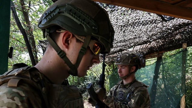 Members of the 65th Separate Mechanized Brigade of the Ukrainian armed forces attend a military drill near a front line, in the Zaporizhzhia region on Saturday.
