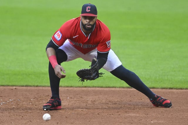 Aug 25, 2025; Cleveland, Ohio, USA; Cleveland Guardians first baseman Carlos Santana (41) fields a ground ball in the third inning against the Tampa Bay Rays at Progressive Field. Mandatory Credit: David Richard-Imagn Images/File Photo