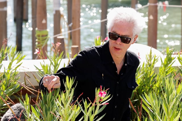 Cast member Jim Jarmusch gestures, on the day of a photocall for the movie "Father Mother Sister Brother" in competition, at the 82nd Venice International Film Festival, in Venice, Italy, August 31, 2025. REUTERS/Remo Casilli