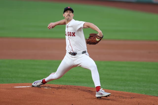 BOSTON, MASSACHUSETTS - AUGUST 19: Walker Buehler #0 of the Boston Red Sox delivers a pitch during the first inning against the Baltimore Orioles at Fenway Park on August 19, 2025 in Boston, Massachusetts.