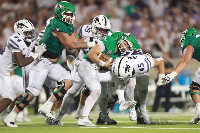 Kansas State Wildcats offensive lineman JB Nelson (54) blocks North Dakota Fighting Hawks quarterback Jerry Kaminski (11) during the second half against the North Dakota Fighting Hawks at Bill Snyder Family Stadium on Aug. 30, 2025.