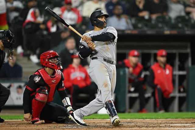 CHICAGO, ILLINOIS - AUGUST 29: Trent Grisham #12 of the New York Yankees hits a grand slam against the Chicago White Sox during the fourth inning at Rate Field on August 29, 2025 in Chicago, Illinois.