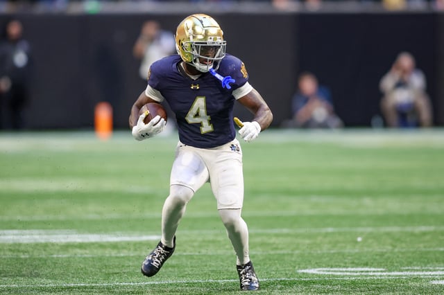 Oct 19, 2024; Atlanta, Georgia, USA; Notre Dame Fighting Irish running back Jeremiyah Love (4) runs the ball against the Georgia Tech Yellow Jackets in the fourth quarter at Mercedes-Benz Stadium. Mandatory Credit: Brett Davis-Imagn Images/File photo