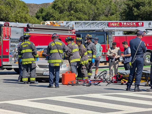 Just two days after a bicyclist was killed in Woodside, another cyclist was injured Sunday afternoon after being hit by a car at Canada and Edgewood roads near Filoli on Aug. 31, 2025. Photo by Adam Dawes.