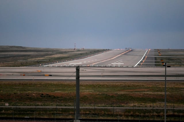 DENVER, COLORADO - APRIL 15: A runway is empty at Denver International Airport on April 15, 2020 in Denver, Colorado. Air travel through the airport is down 95% since the start of the Coronavirus pandemic. (Photo by Helen H. Richardson/The Denver Post)