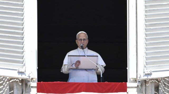 Pope Leo XIV addresses the crowd from the window of the apostolic palace overlooking St.Peter's Square during his Sunday Angelus prayer at the Vatican. Photo: Alberto Pizzoli/AFP via Getty Images