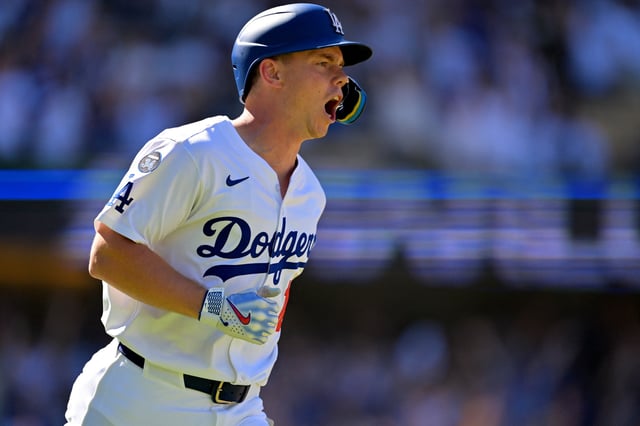Aug 31, 2025; Los Angeles, California, USA;  Los Angeles Dodgers catcher Will Smith (16) celebrates as he rounds the bases on a walk-off home run in the ninth inning against the Arizona Diamondbacks at Dodger Stadium. Mandatory Credit: Jayne Kamin-Oncea-Imagn Images