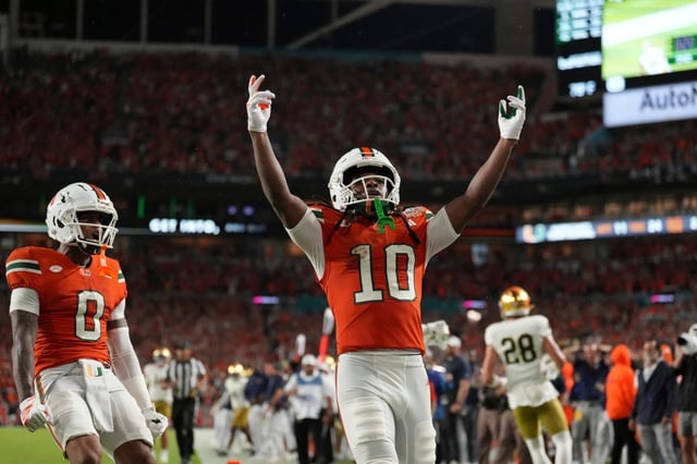 Miami Hurricanes treceiver Malachi Toney (10) celebrates after his touchdown in the first half during an NCAA football game on Sunday, Aug. 31, 2025 in Miami. (AP Photo/Peter Joneleit)