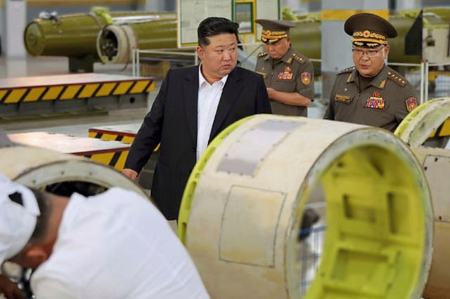 North Korean leader Kim Jong Un inspects a new weapons factory in undisclosed location, North Korea, on August 31, 2025.