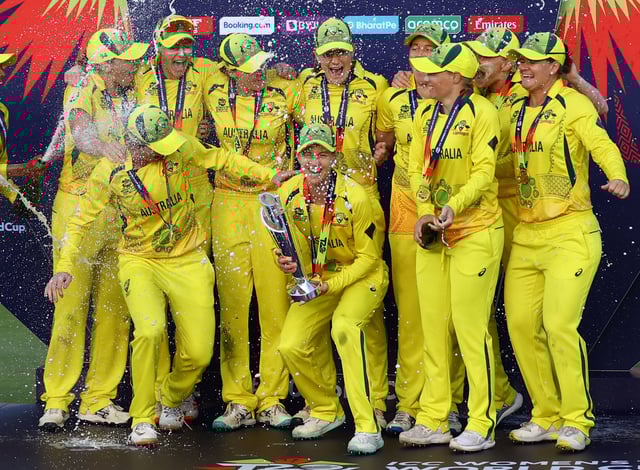 Cricket - - Final - South Africa v Australia - Newlands Cricket Ground, Cape Town, South Africa - February 26, 2023 Australia's Meg Lanning celebrates with the trophy and teammates after winning the ICC Women’s Cricket T20 World Cup REUTERS/Siphiwe Sibeko/File photo