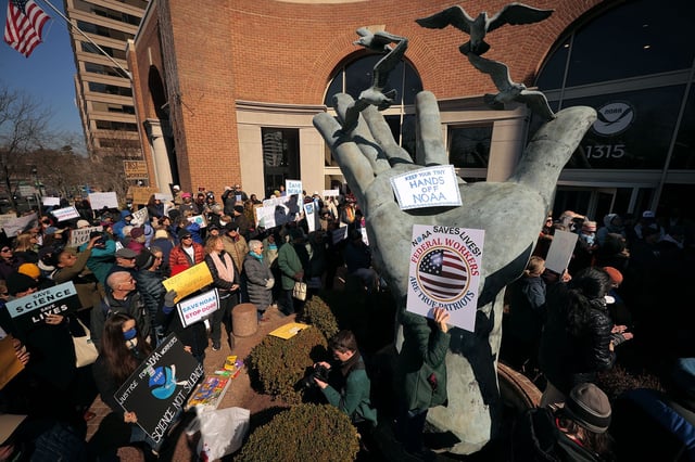 Hundreds of demonstrators gather to protest against Department of Government Efficiency (DOGE) cuts outside the headquarters of the National Oceanic and Atmospheric Administration on March 03, 2025 in Silver Spring, Maryland. Last week the Trump administration fired about 800 probationary staff at NOAA, one of the world’s premier centers for climate science. The layoffs are on top of about 500 employees who left the agency after taking the so-called deferred resignation offer.