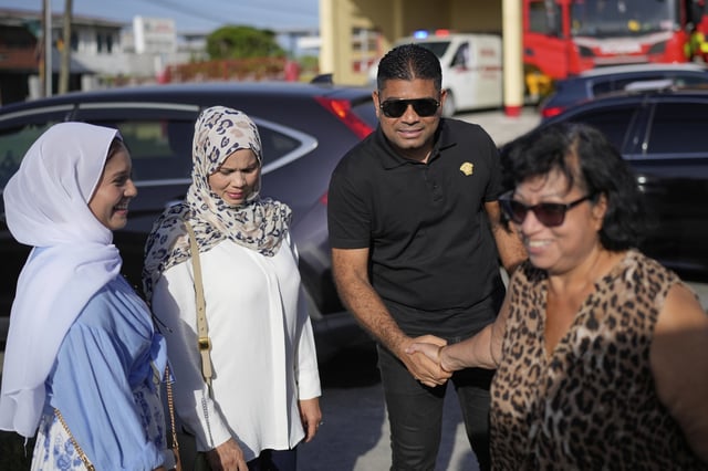 Presidential candidate Azruddin Mohamed of the We Invest in Nationhood party greets supporters after voting in general elections in Georgetown, Guyana, Monday, Sept. 1, 2025. (AP Photo/Matias Delacroix)