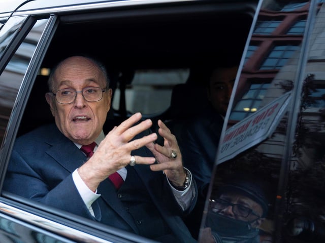 FILE - Rudy Giuliani talks to reporters as he leaves after his defamation trial in Washington, Dec. 15, 2023. Giuliani has been disbarred in New York. The former New York City mayor, federal prosecutor and legal adviser to Donald Trump received the decision Tuesday, July 2, 2024 from an appeals court in Manhattan. (AP Photo/Jose Luis Magana, File)