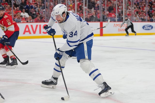 May 16, 2025; Sunrise, Florida, USA; Toronto Maple Leafs center Auston Matthews (34) shoots and scores against the Florida Panthers during the third period in game six of the second round of the 2025 Stanley Cup Playoffs at Amerant Bank Arena. Mandatory Credit: Sam Navarro-Imagn Images