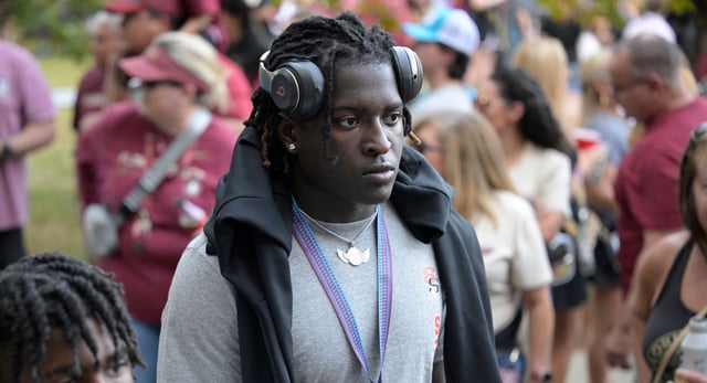 Seminole linebacker Ethan Pritchard walks to the stadium before an NCAA college football game between Florida State and Duke, Saturday, Oct. 21, 2023, in Tallahassee, Fla. (AP Photo/Phelan M. Ebenhack)